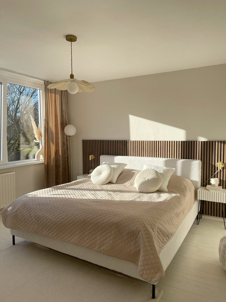 Walnut akupanel used in a bedroom as a headboard